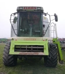 Зерноуборочный комбайн Claas Lexion 460, 1999 г.в. + жатка С750, транспортная тележка, б/у